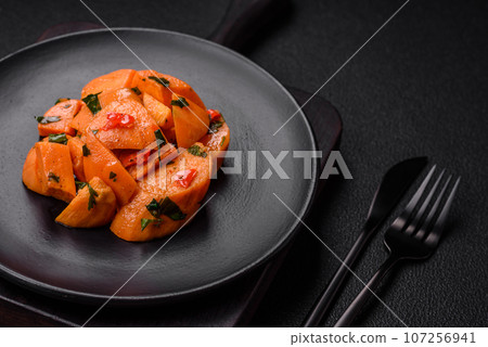 Delicious stewed sweet potato with salt, spices and herbs Delicious stewed sweet potato with salt, spices and herbs 107256941
