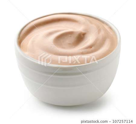 bowl of tomato and mayonnaise sauce 107257114