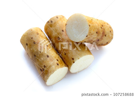 Fresh nagaimo on white background. Fresh nagaimo on white background. 107258688
