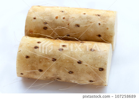 Fresh nagaimo on white background. Fresh nagaimo on white background. 107258689