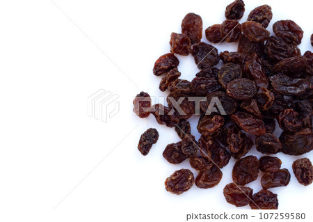 Dried grape on white background. Dried grape on white background. 107259580