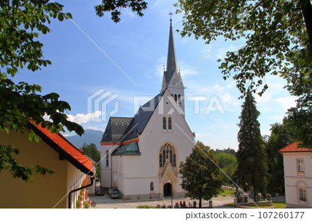 St. Martin's Church built on the cliffs of Lake Bled in Slovenia, southern Europe 107260177
