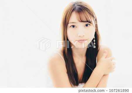 Photo of a young woman standing indoors 107261890