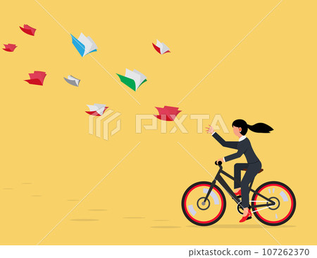 Learning aspiration concept. Businesswomen riding a bicycle according to a flying book 107262370
