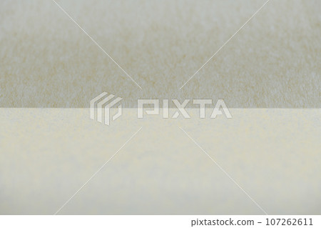 Background material with light and dark image made of Japanese paper (beige) 107262611