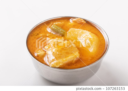 Thai curry (yellow) pork, vegetables, turmeric, cumin, coconut milk Thai curry (yellow) pork, vegetables, turmeric, cumin, coconut milk 107263153