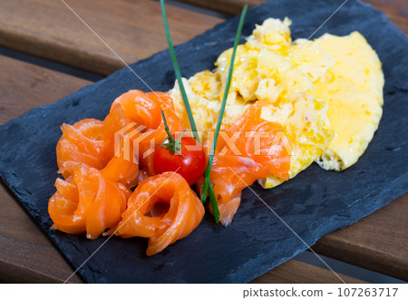 Omelette with smoked salmon Omelette with smoked salmon 107263717