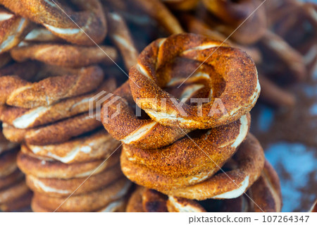 Round baked turkish bagel with sesame Round baked turkish bagel with sesame 107264347