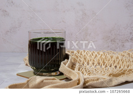 Blue-green algae Chlorella and spirulina powder drink. Super powder. Natural supplement of algae. Detox superfood drink cocktail. Food supplement source of protein and beta carotene 107265668