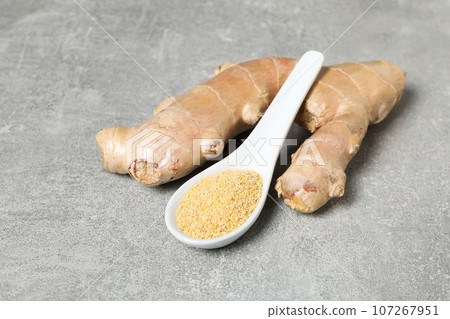 Seasoning and spices concept - ginger, homemade seasoning 107267951