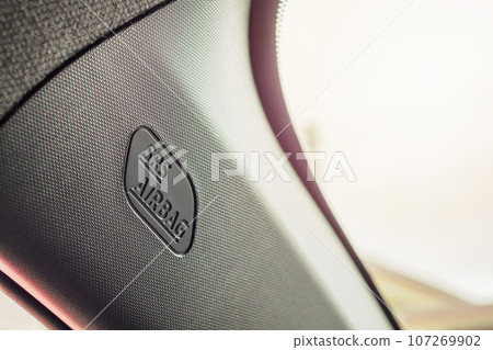 Safety side curtain airbag sign in new modern car Safety side curtain airbag sign in new modern car 107269902