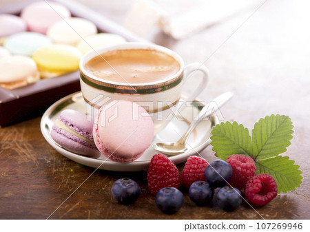 Macaroon on a wooden background Macaroon on a wooden background 107269946