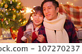 couple play sparkler together 107270237