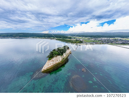 An aerial shot of Mitsuke Island (also known as Gunkanjima), a tourist attraction in Noto, Ishikawa Prefecture 107270523