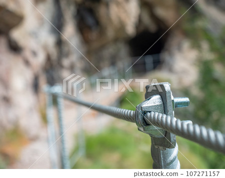 Rope and shackles anchored in hard dolomite limestone rock. Climbers path via ferrata. 107271157