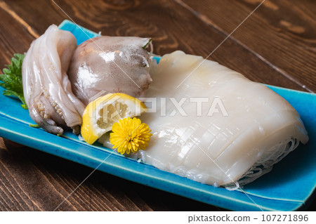 Fresh squid sashimi. Also called squid somen. 107271896