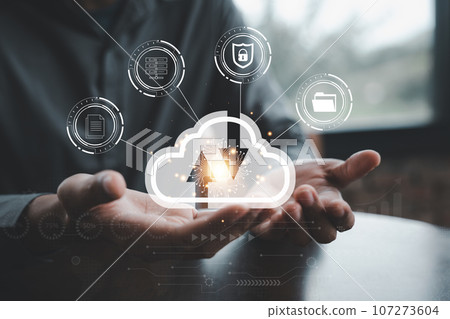 Cloud computing technology in action, a man using a laptop to access the server, network, and storage services with global marketing support, a concept for online businesses. Cloud computing technology in action, a man using a laptop to access the server, network, and storage services with global marketing support, a concept for online businesses. 107273604