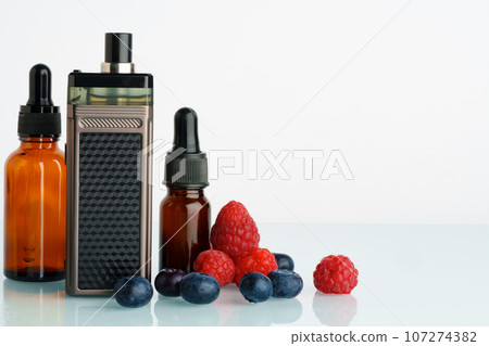 Vape smoking liquid with berry flavor close up Vape smoking liquid with berry flavor close up 107274382