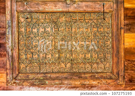 Antique carved wooden windows Antique carved wooden windows 107275193