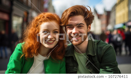 Hip Ireland couple gazing on city street. 107276411