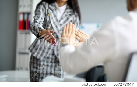 Man and woman co-workers indoors 107278847