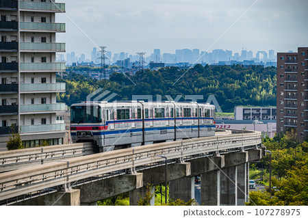 Osaka Monorail Saito Line, train heading towards Banpaku Kinen Koen Station 107278975