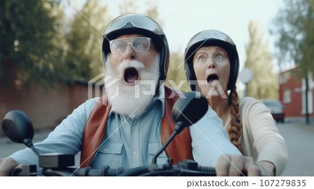 Close-up of a surprised elderly couple in helmets riding a motorcycle on street in the city 107279835