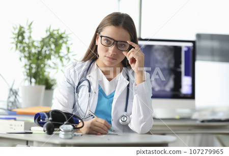 Therapist in medical uniform Therapist in medical uniform 107279965