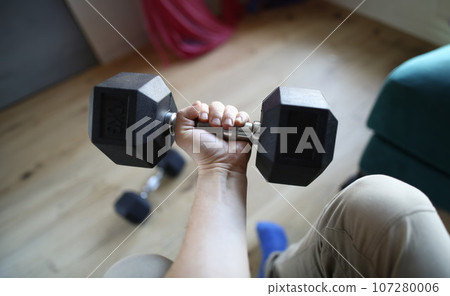 Person workout with tool Person workout with tool 107280006