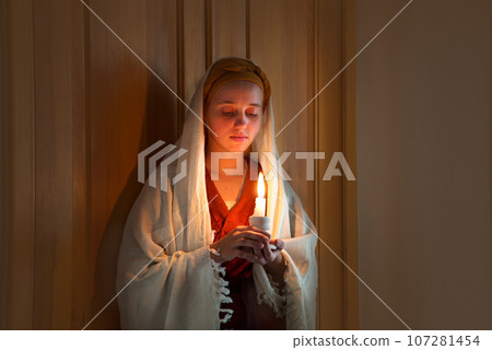 Young pretty gitj whith candle Young pretty gitj whith candle 107281454
