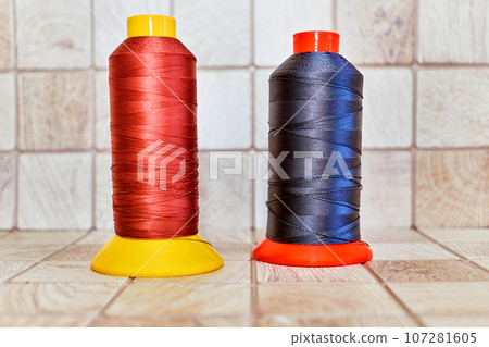 Tailoring supplies, wo spools of thread. Red, black 107281605