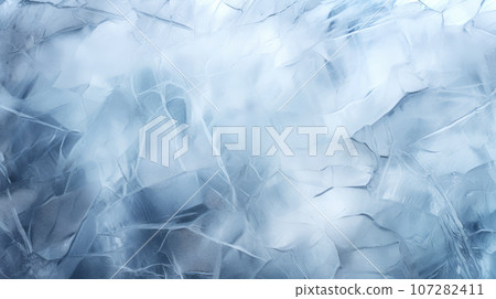 Transparent frozen highlighted blue and white ice and snow texture, structured with cracks and scratches 107282411