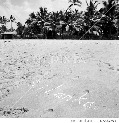 Beautiful seascape on blue sea in open air with yellow sand Beautiful seascape on blue sea in open air with yellow sand 107283294