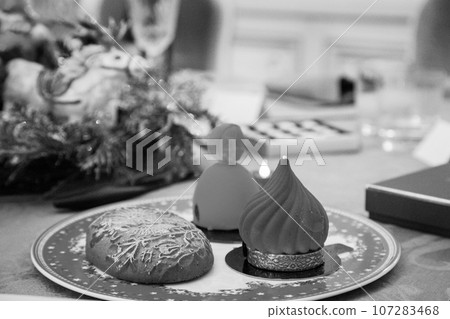 Sweet beautiful dessert cupcake lay on porcelain plate Sweet beautiful dessert cupcake lay on porcelain plate 107283468