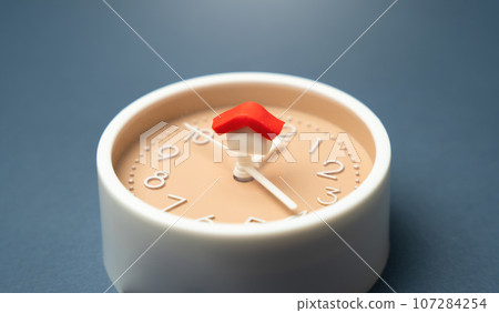 House on the clock. Time management for maintaining a balanced and organized household. Passage of time. Mortgage and loan payments. Rent and realty. House on the clock. Time management for maintaining a balanced and organized household. Passage of time. Mortgage and loan payments. Rent and realty. 107284254