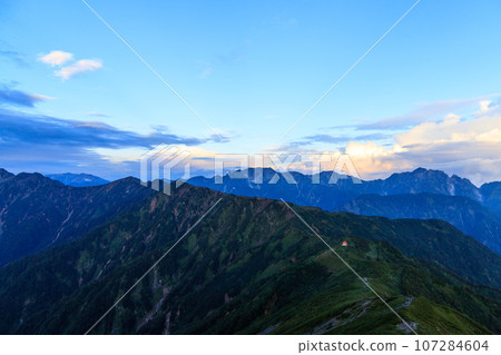 Majestic mountain range and scenery from the top of Mt. Jigatake 107284604