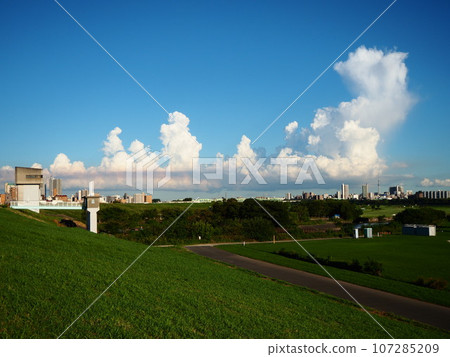 Summer landscape with blue sky and white clouds Summer landscape with blue sky and white clouds 107285209