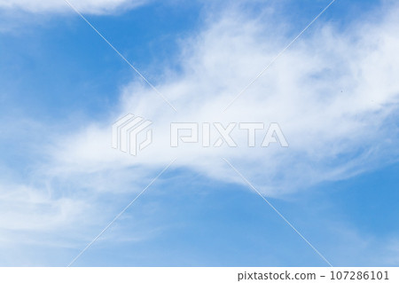 Clear blue color sky with white cloud background Clear blue color sky with white cloud background 107286101