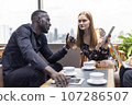 Happiness business team Colleagues talking talking and discuss in cafe during break in restaurant. 107286507