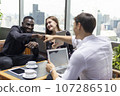 Happiness business team Colleagues talking talking and discuss in cafe during break in restaurant. 107286510