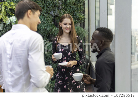 Happiness business team Colleagues talking talking and discuss in cafe during break in restaurant. Happiness business team Colleagues talking talking and discuss in cafe during break in restaurant. 107286512