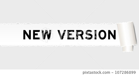 Ripped gray paper background that have word new version under torn part Ripped gray paper background that have word new version under torn part 107286899