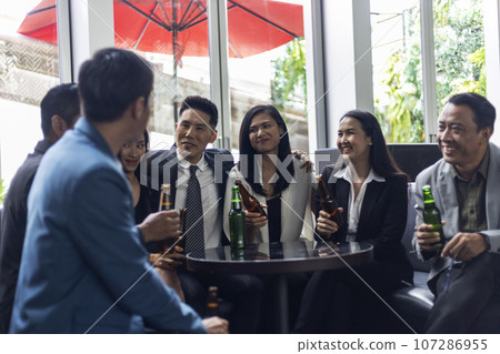 Happiness young bubiness teamwork party activity after work in restaurant. 107286955
