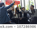 Happiness young bubiness teamwork party activity after work in restaurant. 107286986
