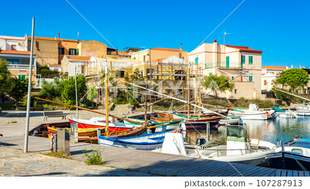 porto di stintino. view at the boats in Stintino marina in Sardinia, Italy porto di stintino. view at the boats in Stintino marina in Sardinia, Italy 107287913