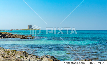 Amazing view of the Pelosa beach with the island of Asinara in the background, Stintino, Sardinia. 107287934