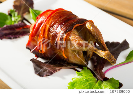 Plate with quail baked in bacon Plate with quail baked in bacon 107289000