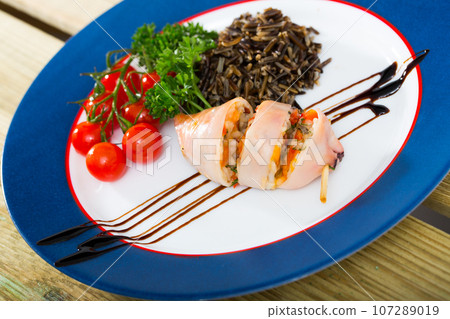 Stuffed squid with wild rice 107289019
