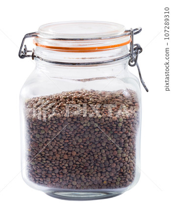 Glass bottle of dry lentils Glass bottle of dry lentils 107289310