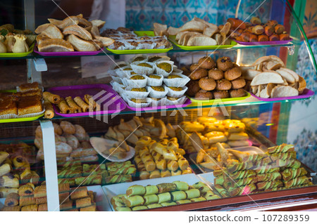 Bakery sweets and bakery products on counter at the entrance to Paris Mosque Bakery sweets and bakery products on counter at the entrance to Paris Mosque 107289359